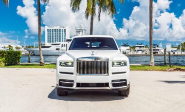 Rolls Royce Cullinan White on Blue exotic rental cars yacht charters Miami