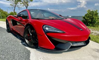 Mclaren 570s Red on Tan exotic rental cars yacht charters Miami
