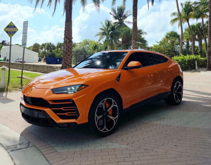 Lamborghini Urus Orange on Black exotic rental cars yacht charters Miami