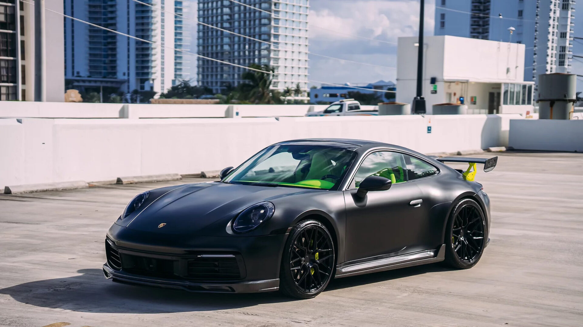 Porsche 911 Carrera S Black on Green exotic rental cars yacht charters Miami