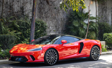 McLaren GT Red on Peanut Butter exotic rental cars yacht charters Miami
