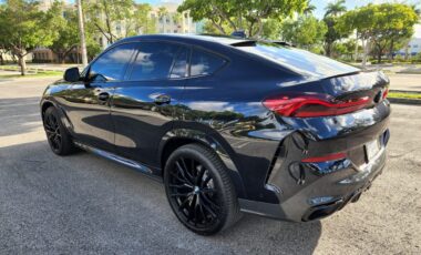 BMW X6M Black on Brown exotic rental cars yacht charters Miami