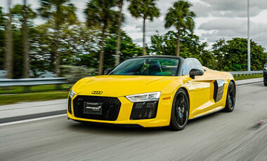 Audi R8 Yellow on Black exotic rental cars yacht charters Miami