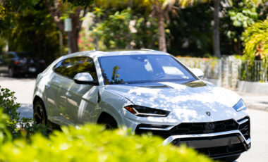 Lamborghini Urus White on Orange exotic rental cars yacht charters Miami