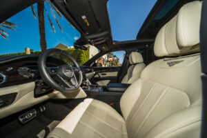 Bentley Bentayga Black on Tan exotic rental cars yacht charters Miami