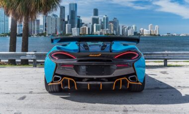 Mclaren 570s Coupe Blue and Orange on Orange exotic rental cars yacht charters Miami