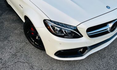 Mercedes-Benz C63 AMG Cabriolet White on Peanut Butter exotic rental cars yacht charters Miami